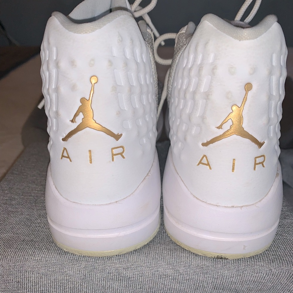 Nike Air Jordans white high top with white laces